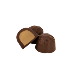 Haven Herb milk chocolate domes with creamy peanut butter filling close up on black background