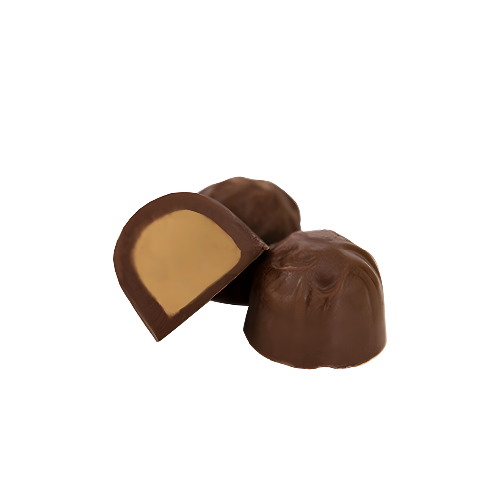 Haven Herb milk chocolate domes with creamy peanut butter filling close up on black background